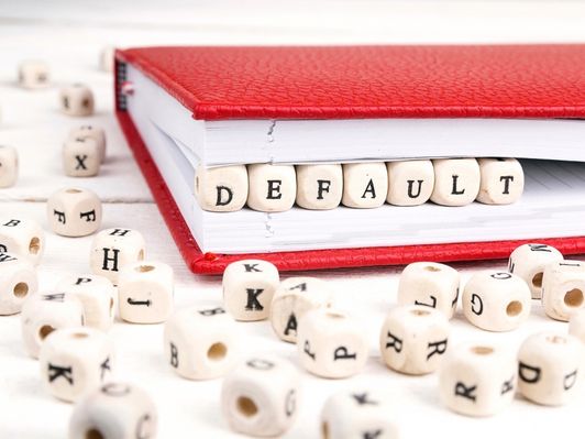 How Long Does a Default Stay on Your Credit Report